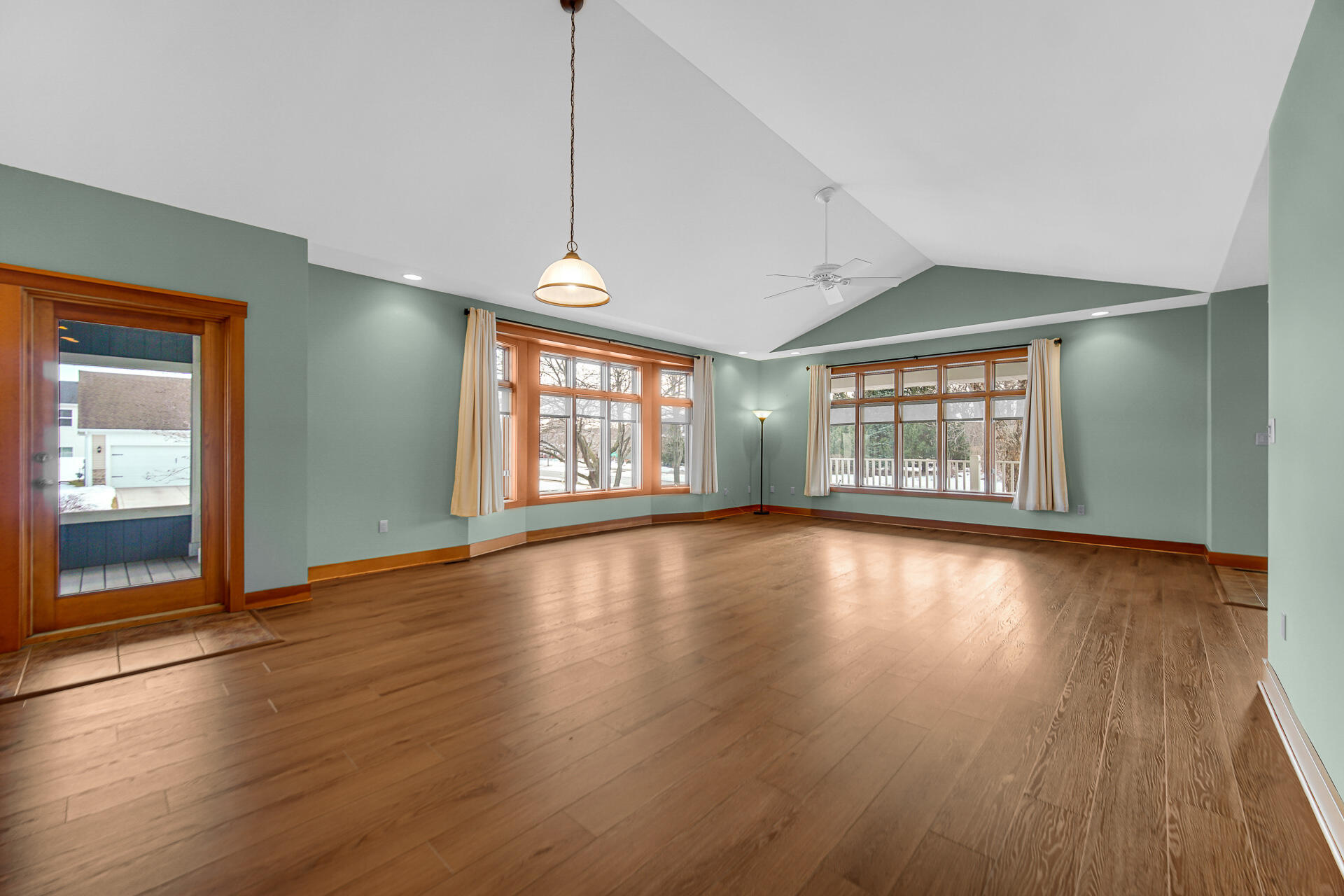 2425 Dickinson Road Chesterton, IN 46304 - Photo 5 of 41 an empty room with wooden floor and windows