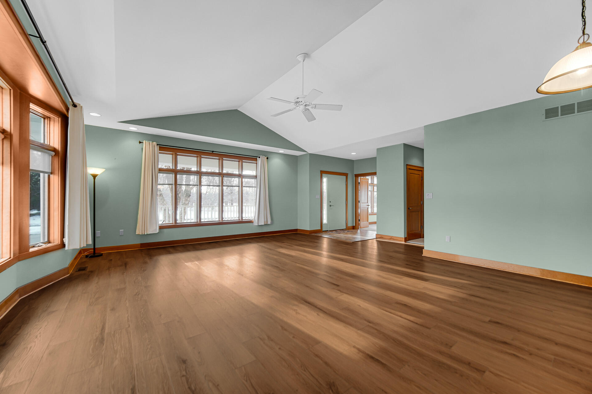 2425 Dickinson Road Chesterton, IN 46304 - Photo 6 of 41 a view of an empty room with wooden floor and a window