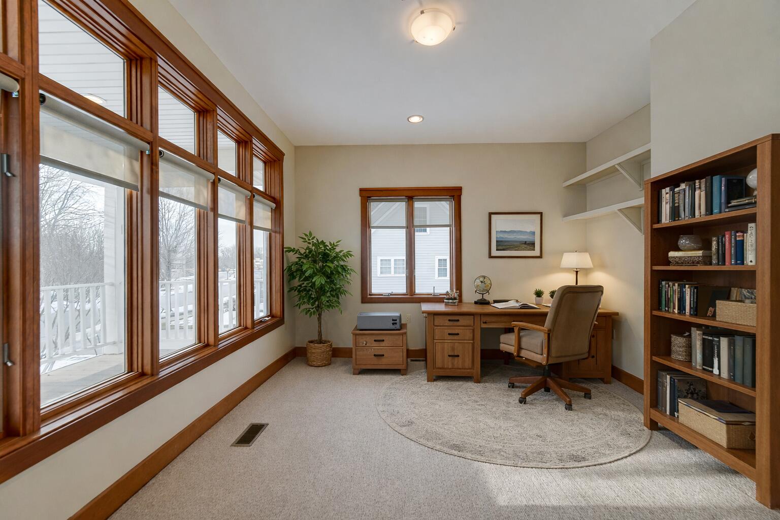 2425 Dickinson Road Chesterton, IN 46304 - Photo 9 of 41 a view of a workspace with furniture and a window