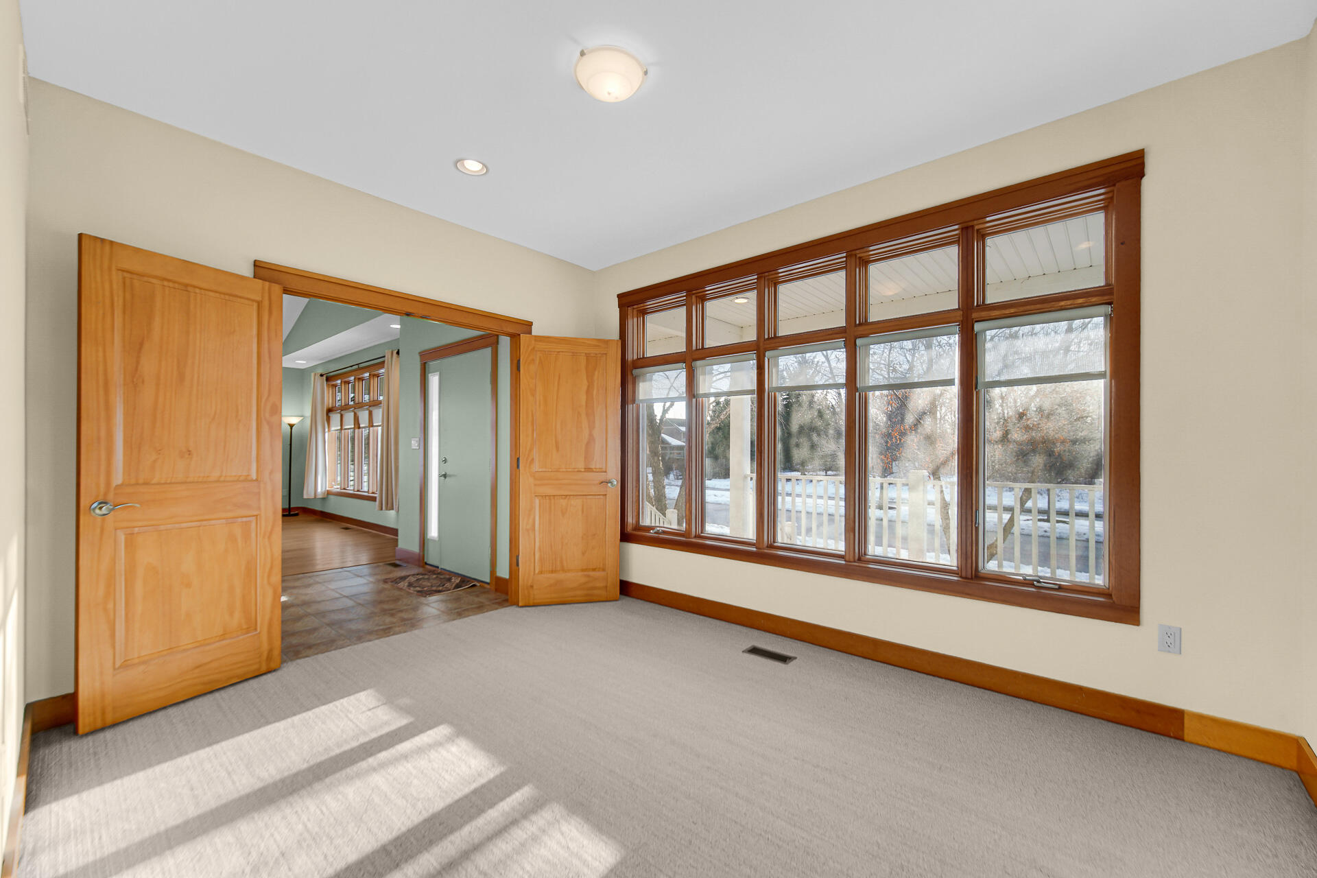 2425 Dickinson Road Chesterton, IN 46304 - Photo 10 of 41 a view of an empty room with a window and wooden floor