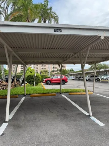 a view of swimming pool with a patio