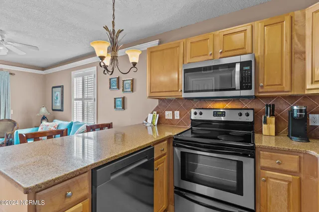 $314,990 | 108 South Lake Park Boulevard, Unit 101, Carolina Beach, NC 28428