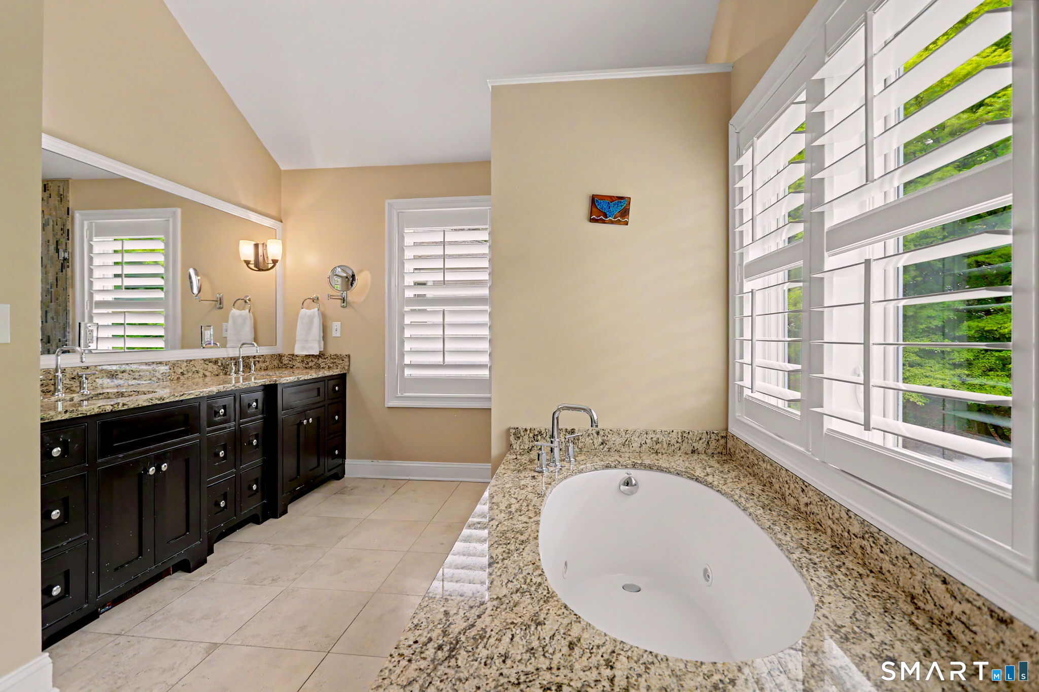 73 Oxbow Road Fairfield, CT 06824 - Photo 16 of 35 Luxurious en-suite bathroom featuring a double vanity