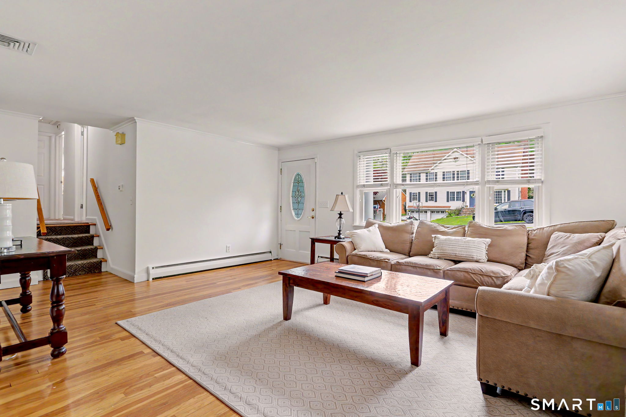 73 Oxbow Road Fairfield, CT 06824 - Photo 3 of 35 Living Room with hardwood floors and an abundance of light