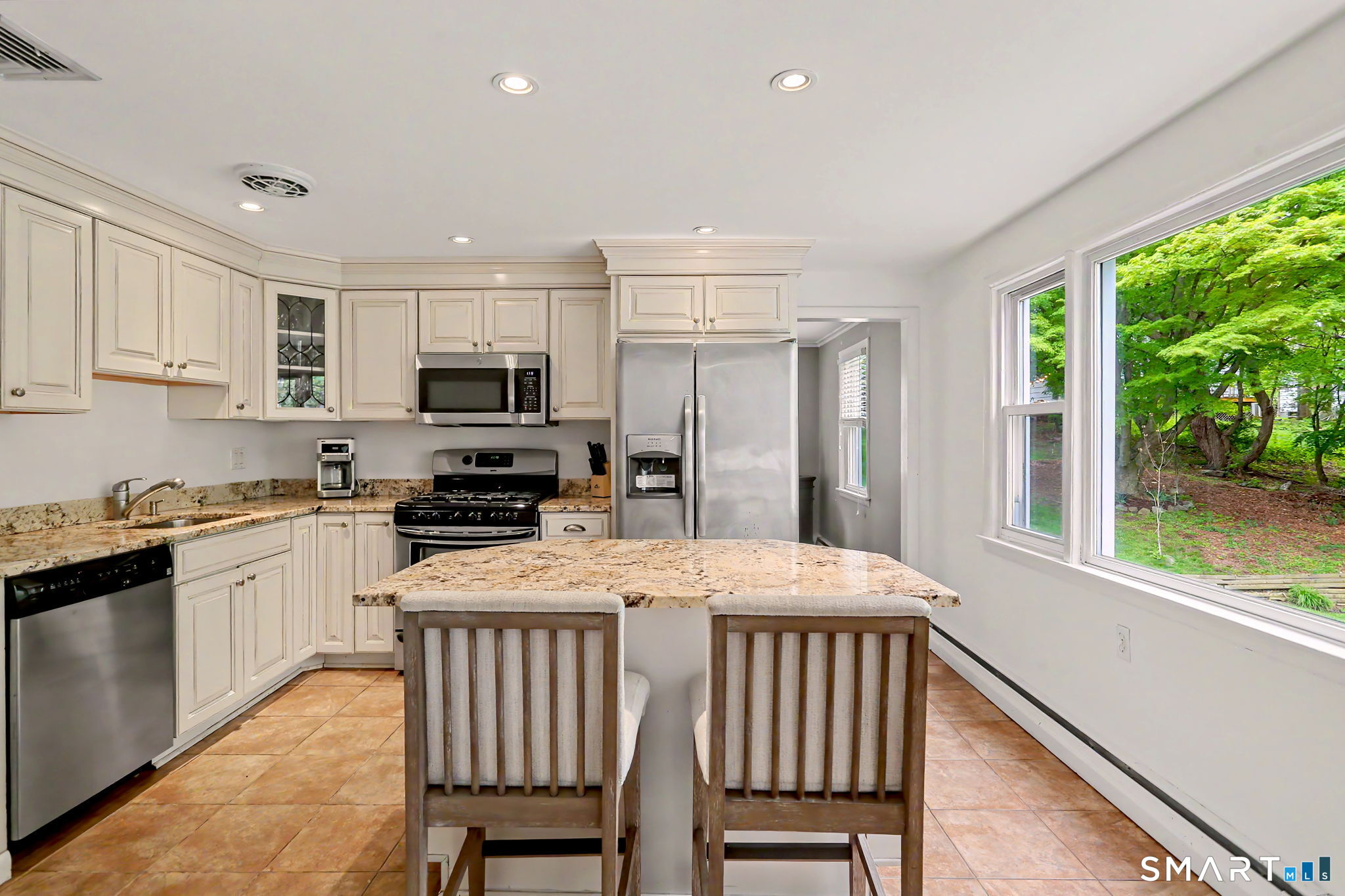 73 Oxbow Road Fairfield, CT 06824 - Photo 6 of 35 Great view of the yard from Kitchen!