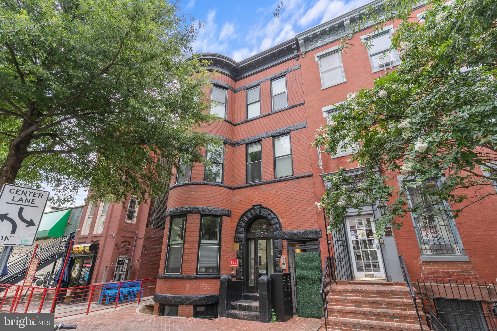 a front view of a multi story residential apartment buildings