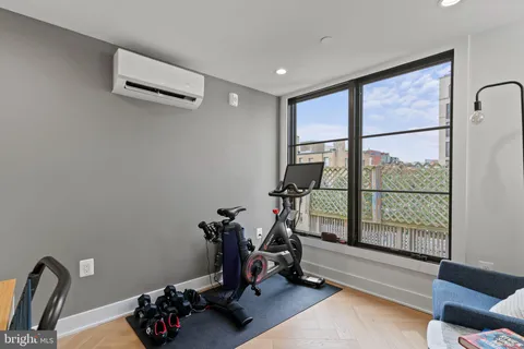 a view of a room with gym equipment