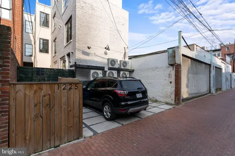 a car parked in front of a house