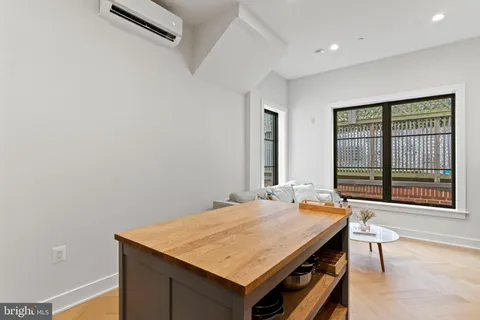 a room with a table and chairs