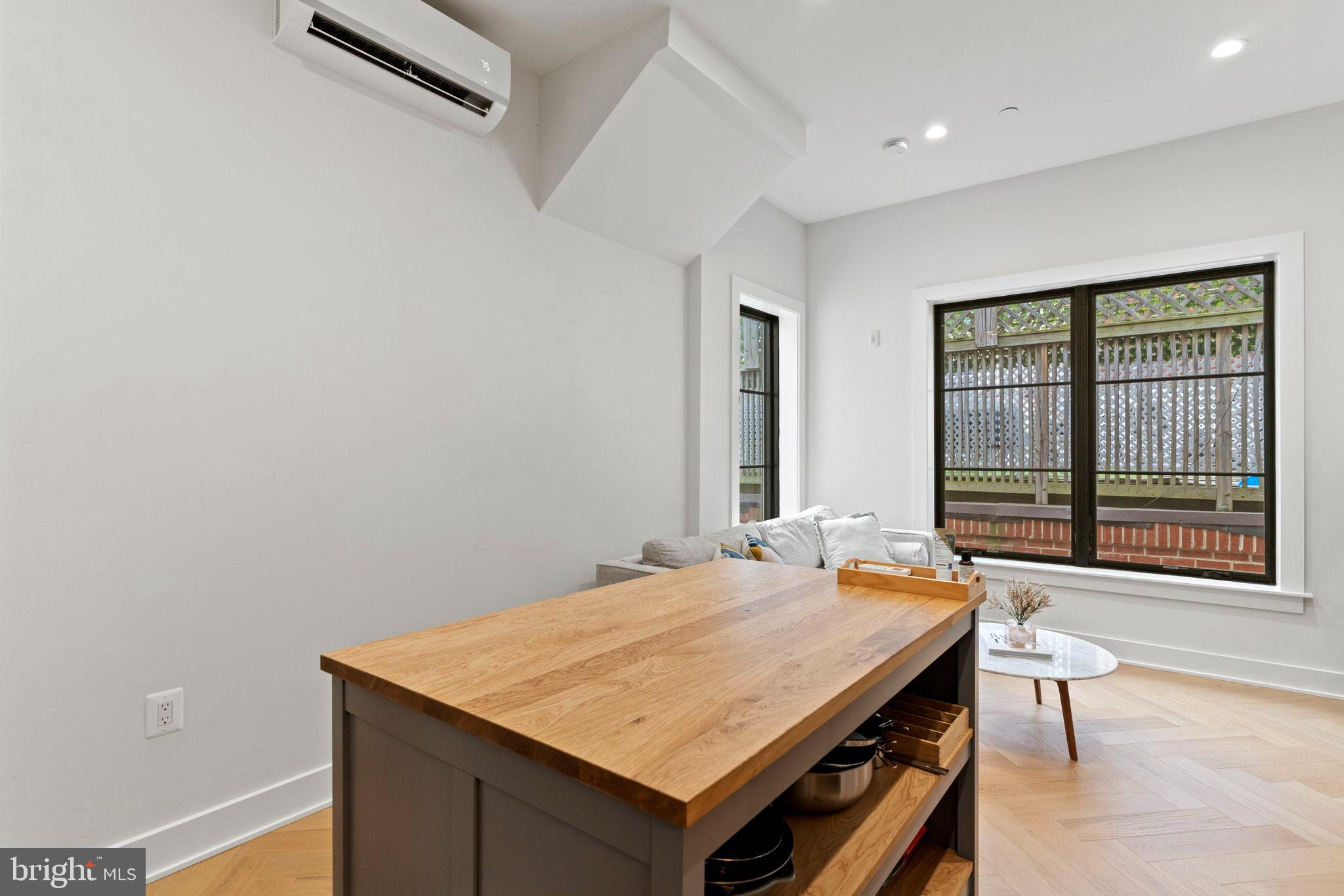 1225 11th Street Northwest, Unit 9 Washington, DC 20001 - Photo 5 of 20 a room with a table and chairs