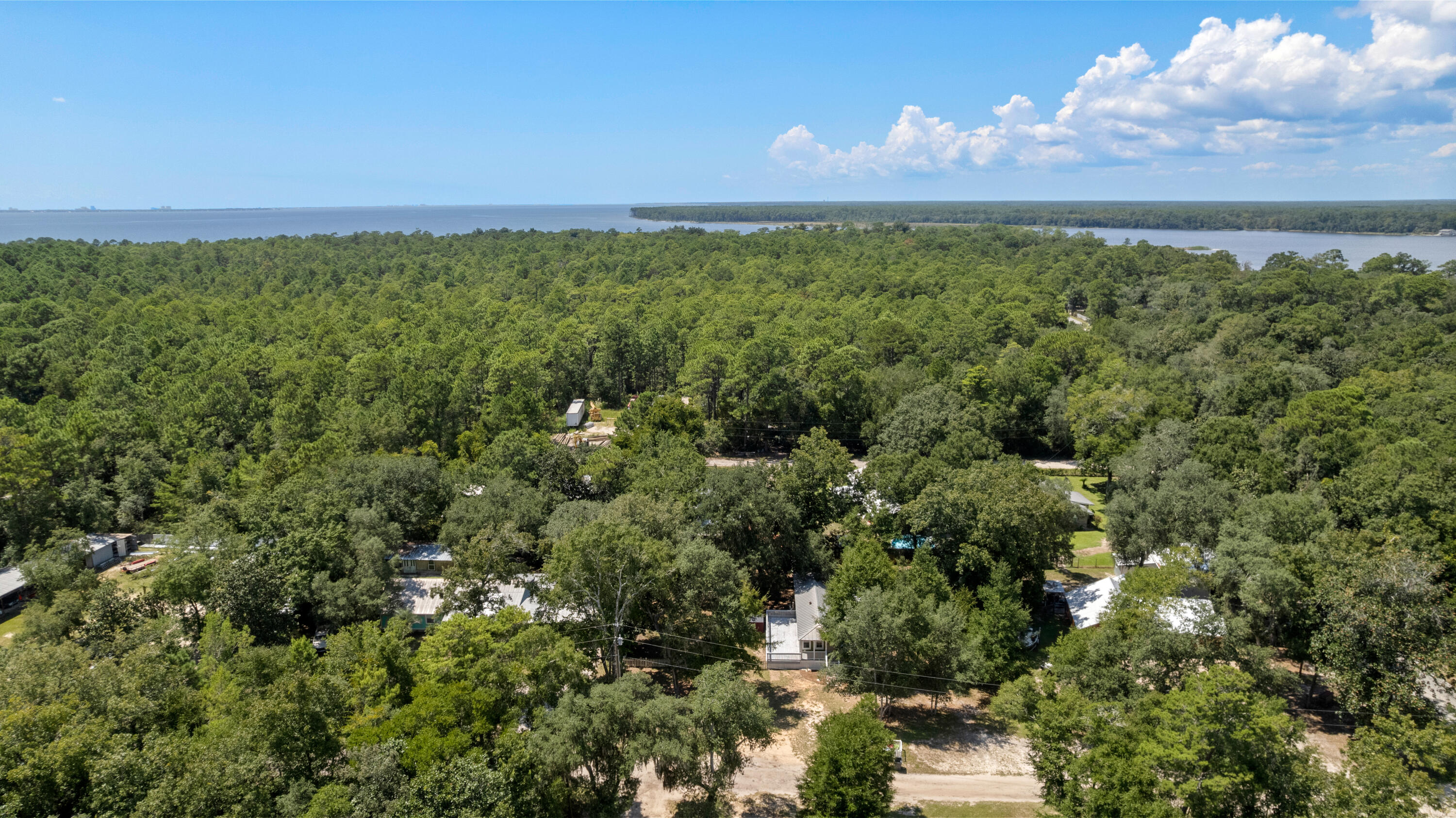 40 Horseshoe Lane Freeport, FL 32439 - Photo 16 of 16 an aerial view of residential house with outdoor space