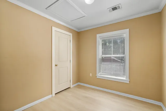 an empty room with windows