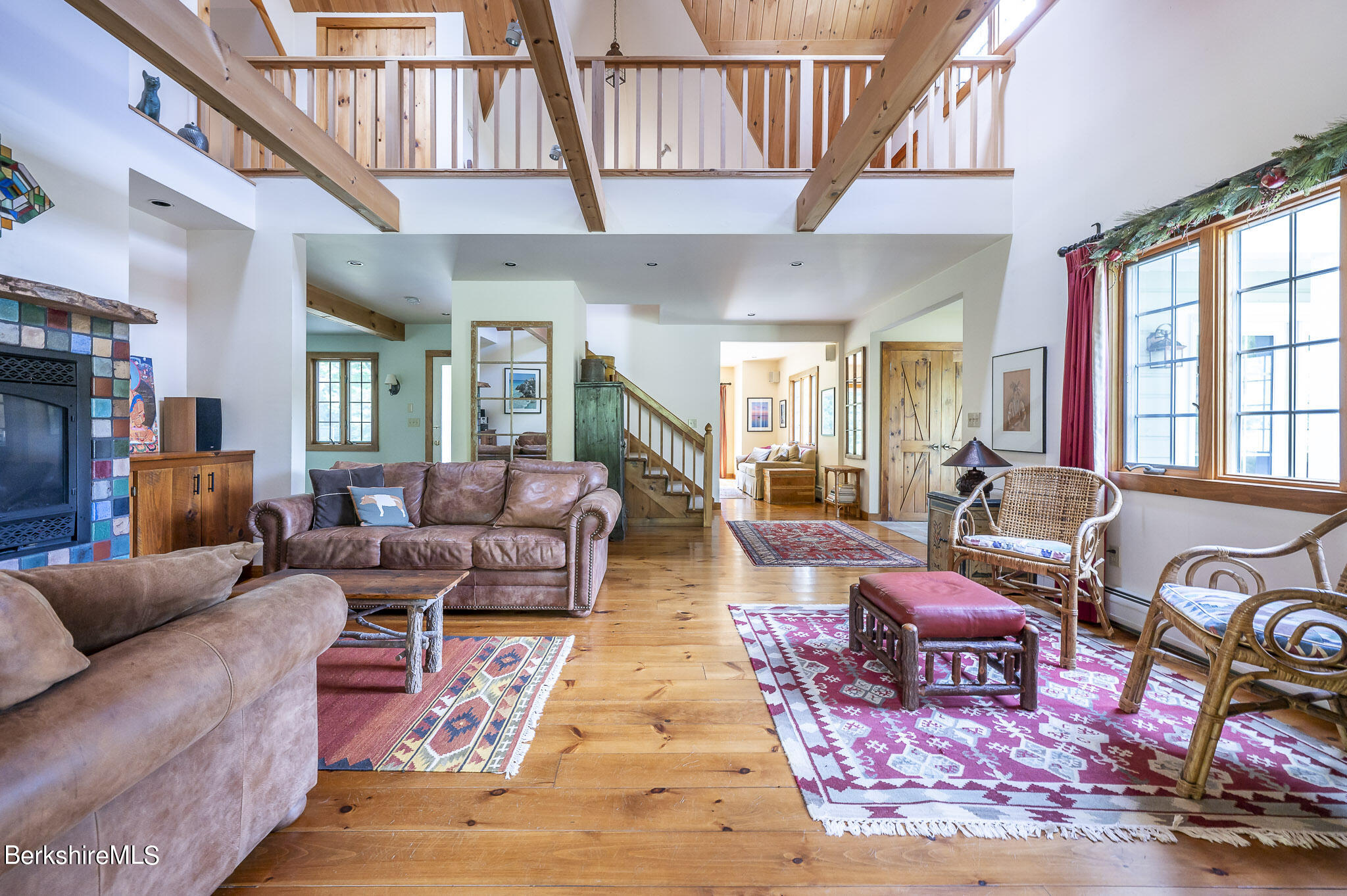47 E Road Alford, MA 01266 - Photo 12 of 46 a living room with fireplace furniture and a wooden floor