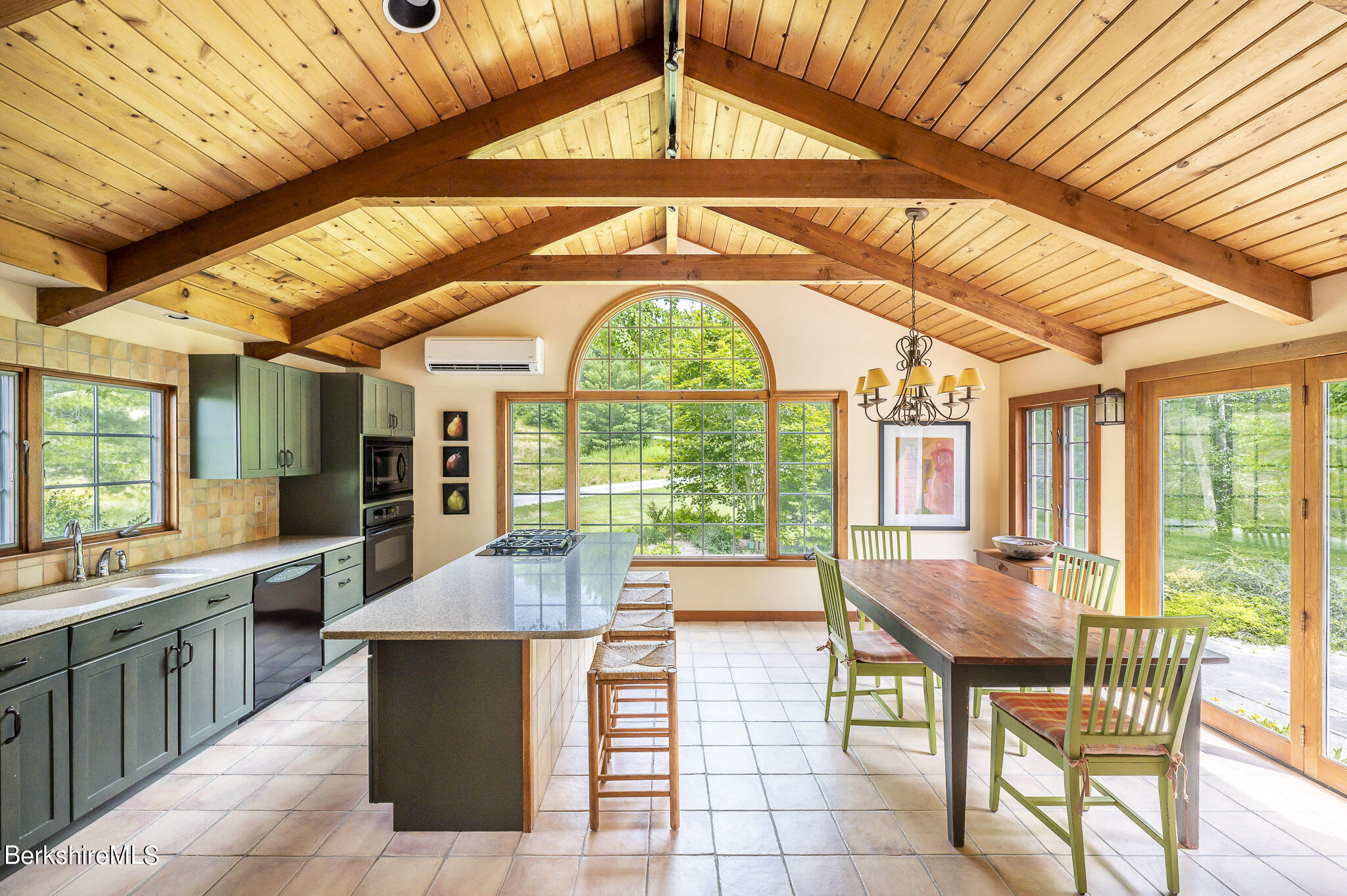 47 E Road Alford, MA 01266 - Photo 13 of 46 a dining room with wooden floor and furniture