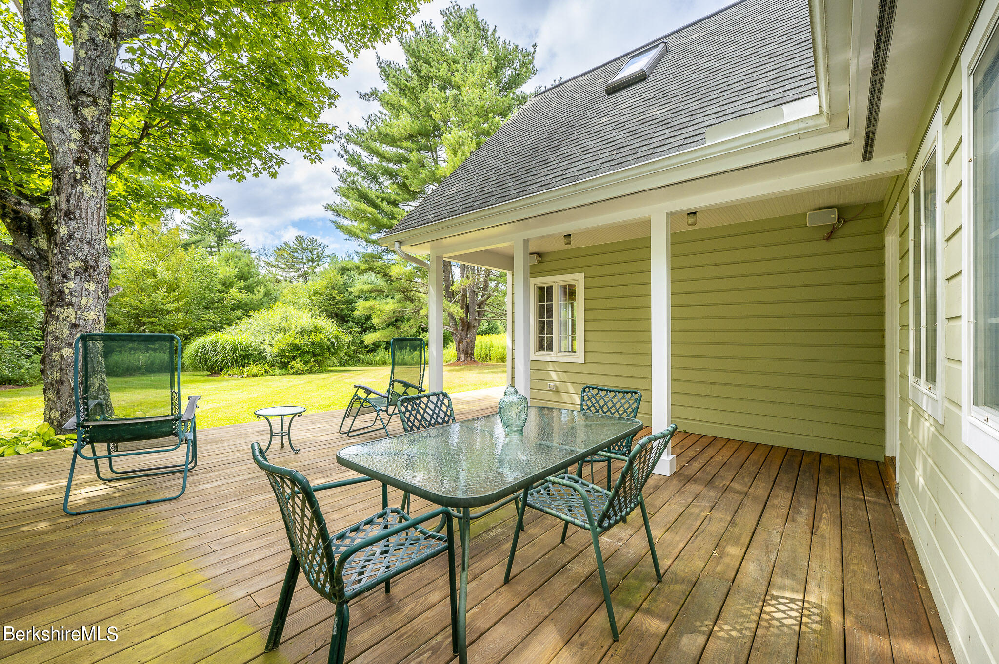 47 E Road Alford, MA 01266 - Photo 39 of 46 a view of a patio with a table and chairs