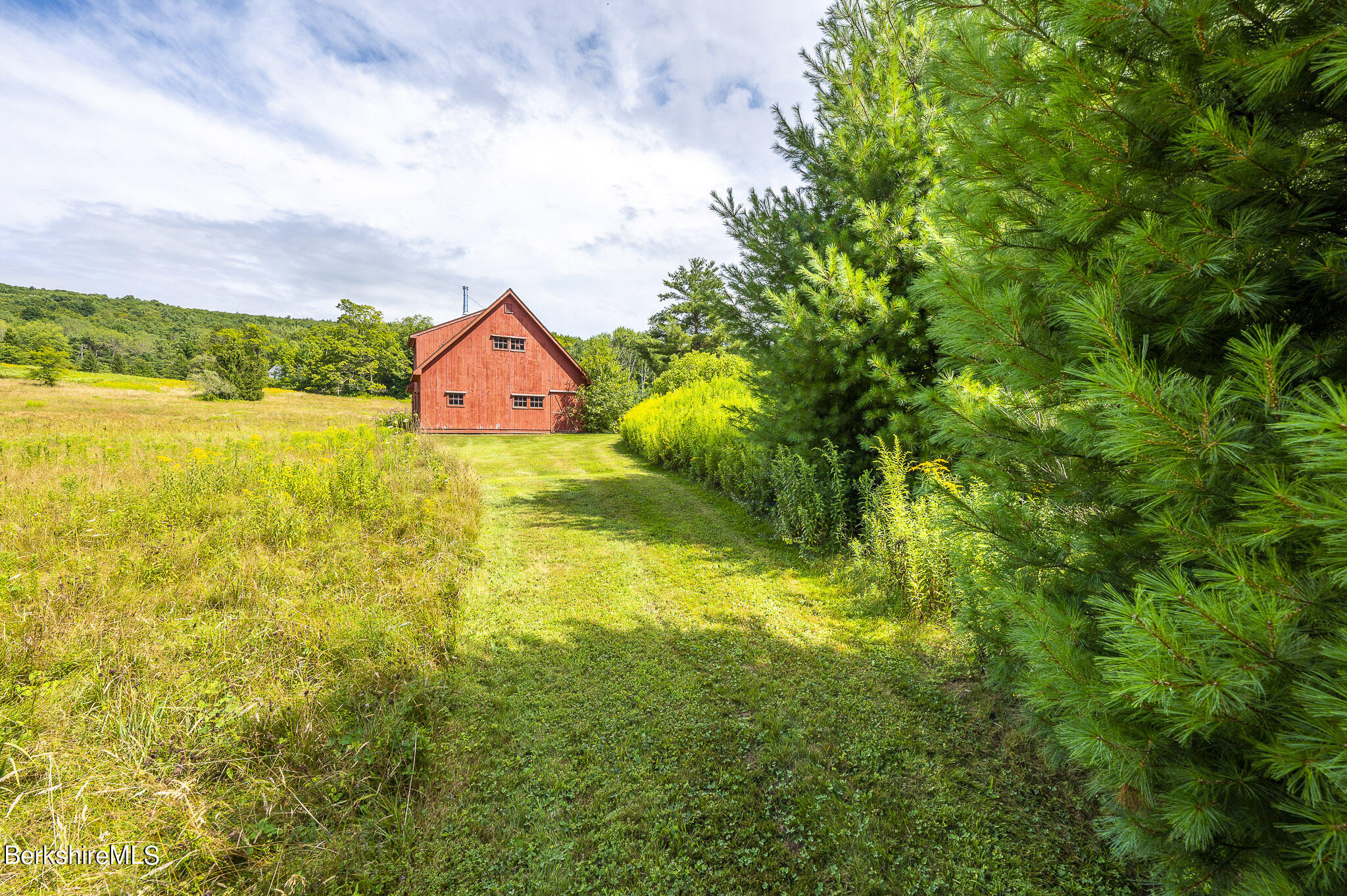 47 E Road Alford, MA 01266 - Photo 41 of 46 a view of an ocean with beach and garden