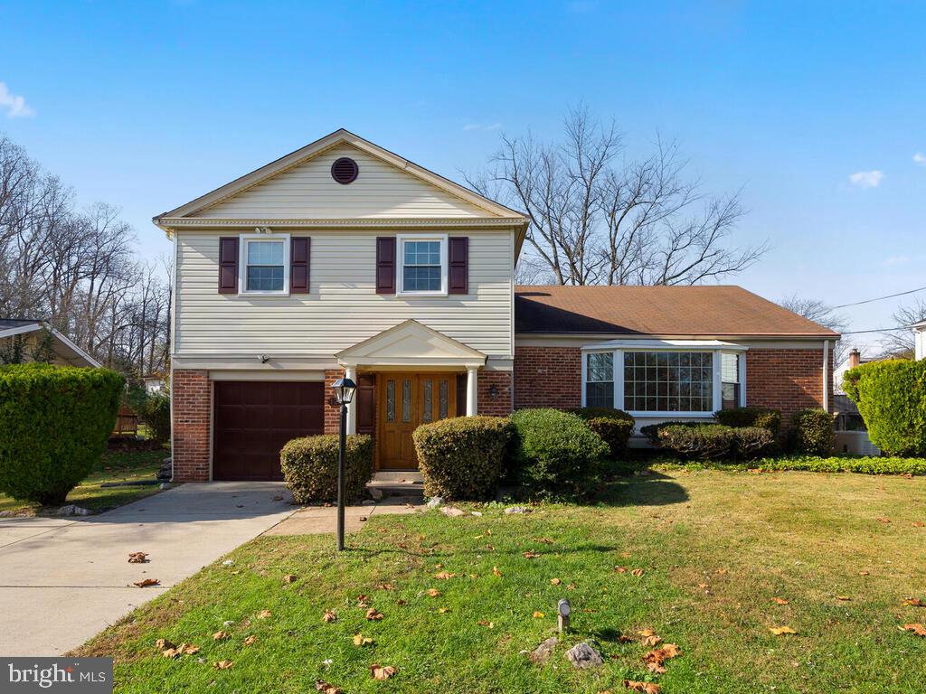 12714 Teaberry Road Silver Spring, MD 20906 - Photo 1 of 30 a front view of house with yard and green space