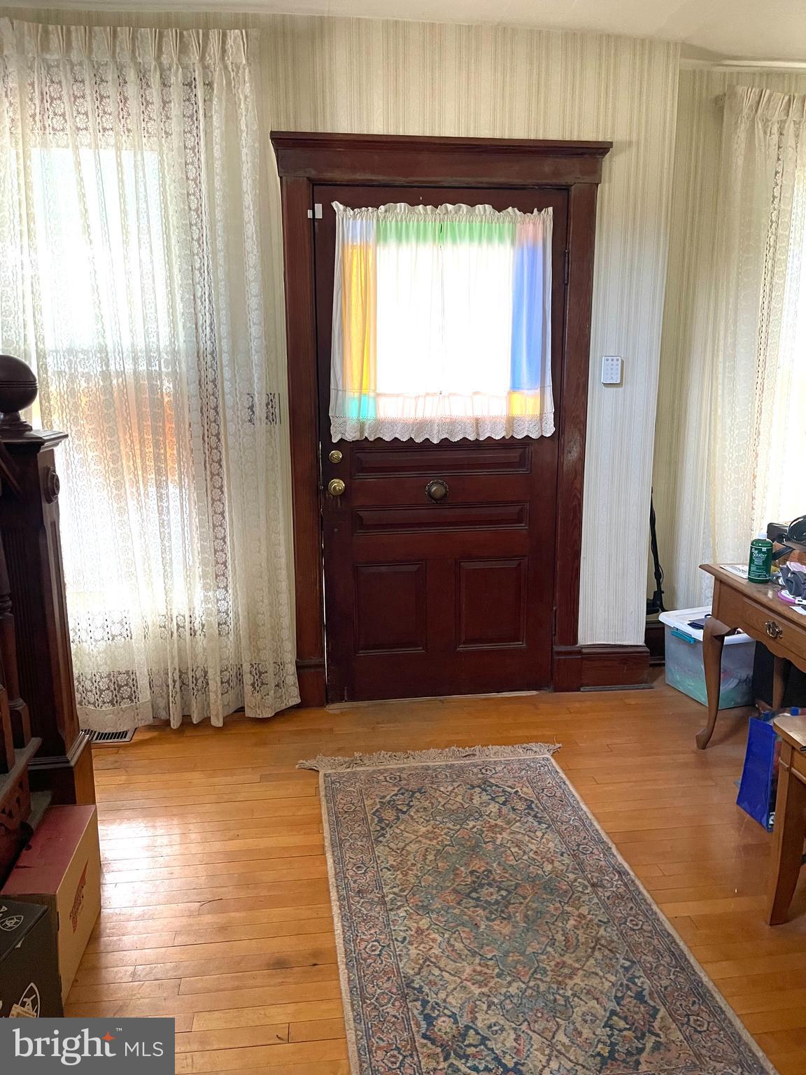 6310 St Leonard Road St. Leonard, MD 20685 - Photo 13 of 26 wooden floor in an empty room with a window