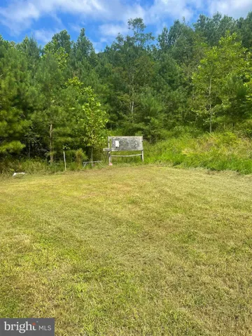 a view of a yard with an outdoor space