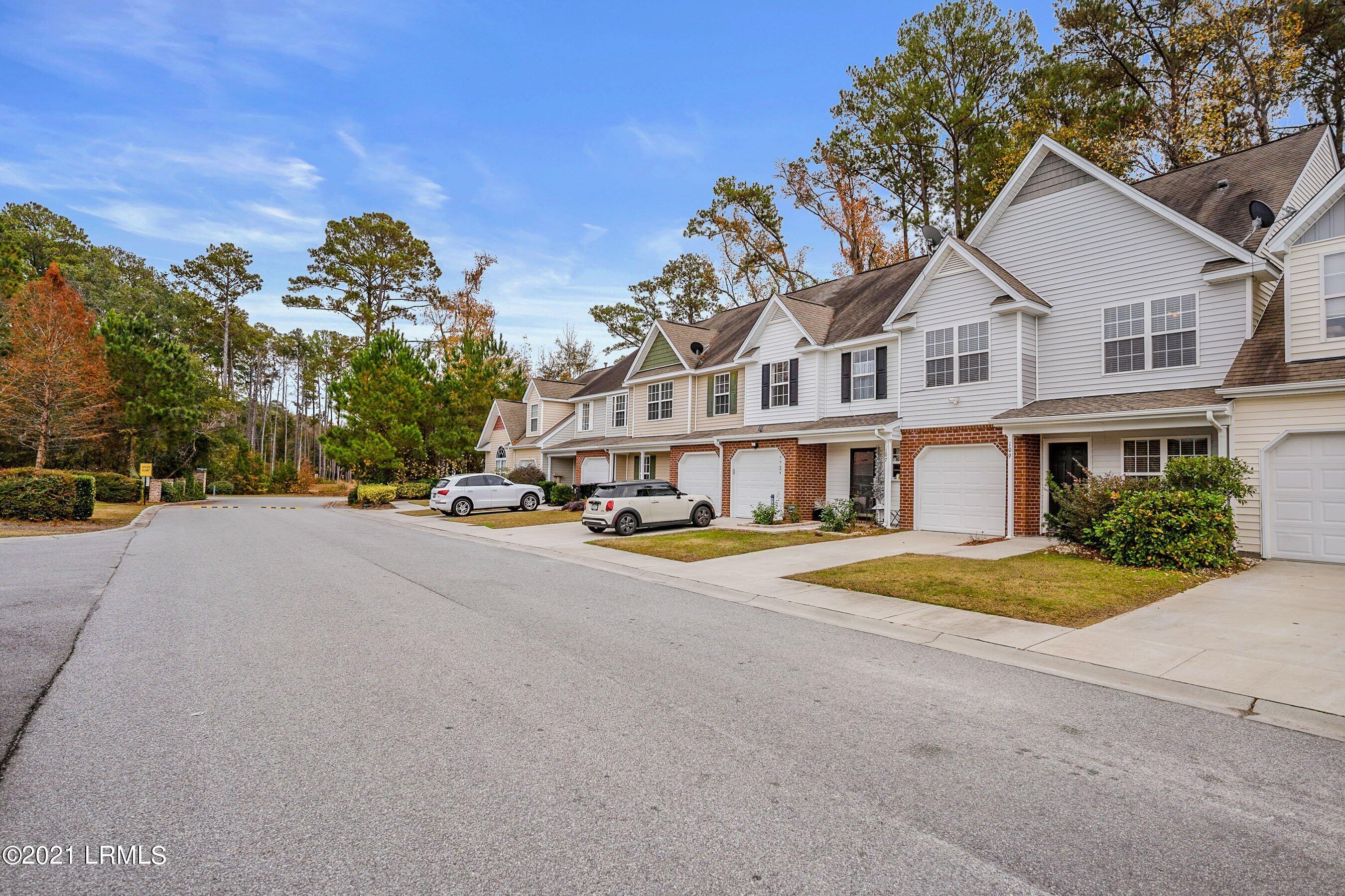 109 Bella Way Beaufort, SC 29906 - Photo 2 of 33 1b. Side of townhome view