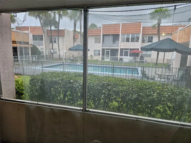 a view of a balcony with an outdoor space