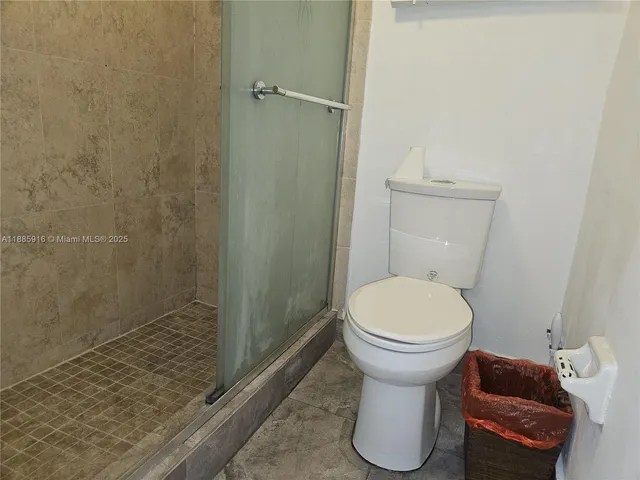 a bathroom with a toilet and a sink