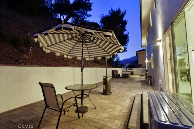 a large kitchen with a sink and cabinets