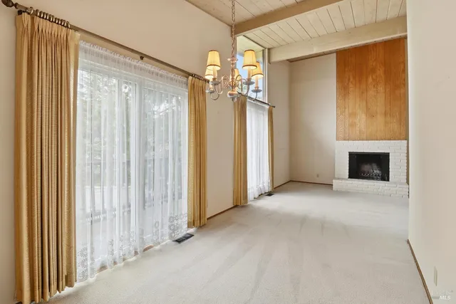 a view of a livingroom with a fireplace