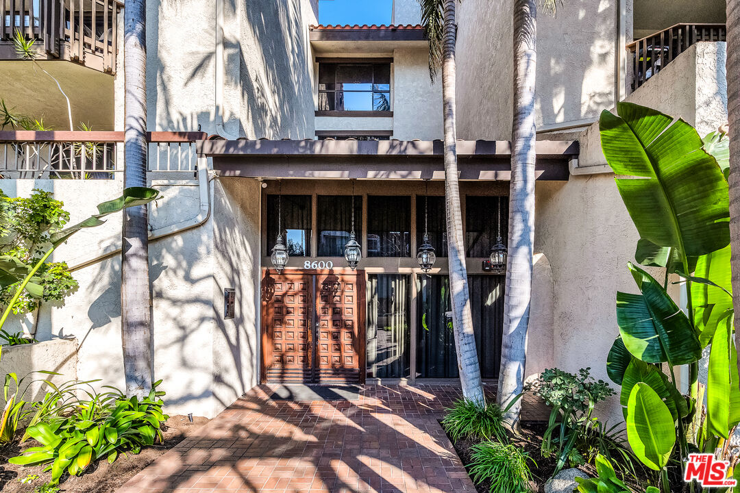 8600 Tuscany Avenue, Unit 202 Playa del Rey, CA 90293 - Photo 21 of 29 a front view of a building with an outdoor space