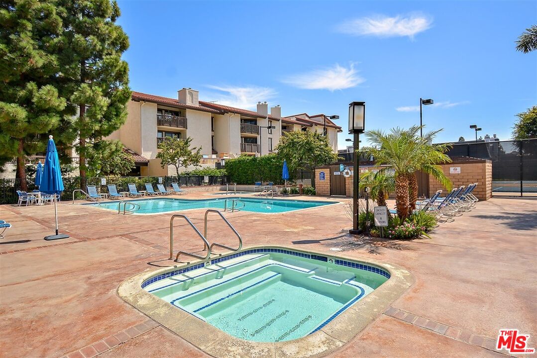 8600 Tuscany Avenue, Unit 202 Playa del Rey, CA 90293 - Photo 27 of 29 a view of a swimming pool with a patio
