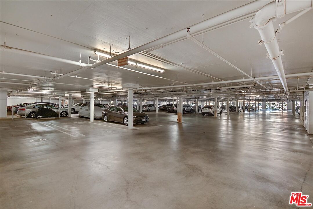 8600 Tuscany Avenue, Unit 202 Playa del Rey, CA 90293 - Photo 29 of 29 a view of parking space with parked cars