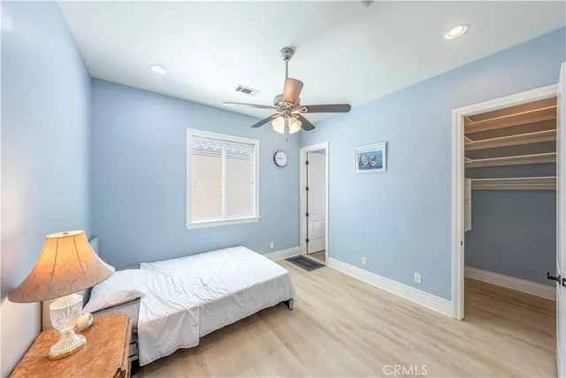 a bathroom with a sink a mirror and a toilet