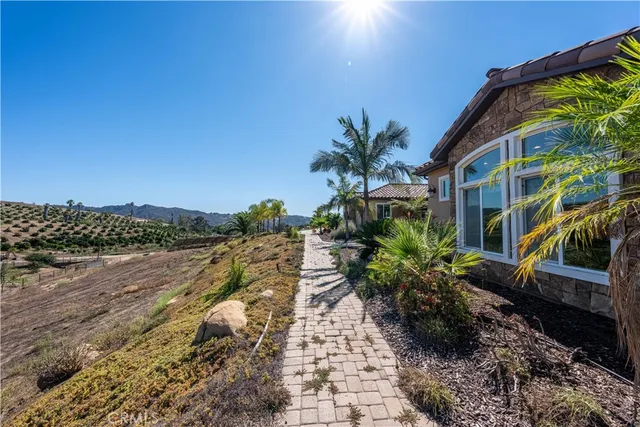a view of a street with a building in the background