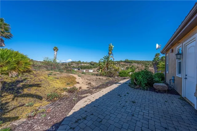 a view of a town with big building in the background