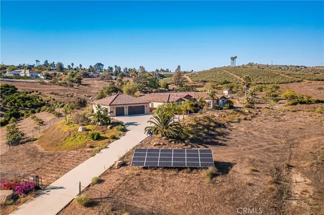 view of a house with a yard
