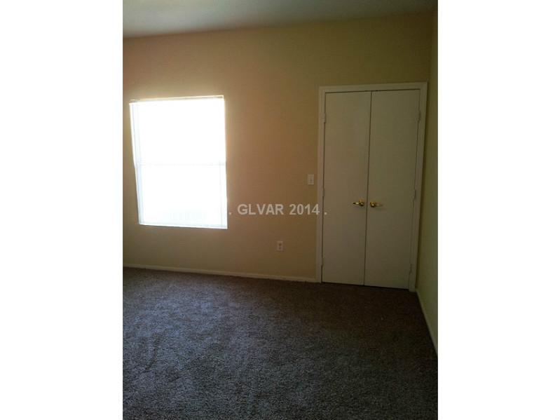 9620 West Russell Road, Unit 1046 Las Vegas, NV 89148 - Photo 20 of 21 Property Photo. BEDROOM WITH WALK IN CLOSET