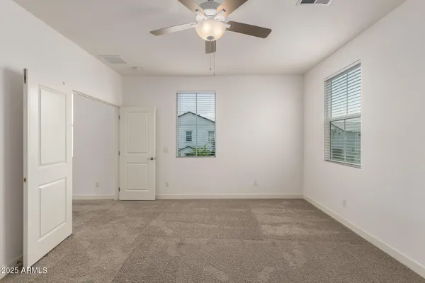a bathroom with a double vanity sink mirror and double