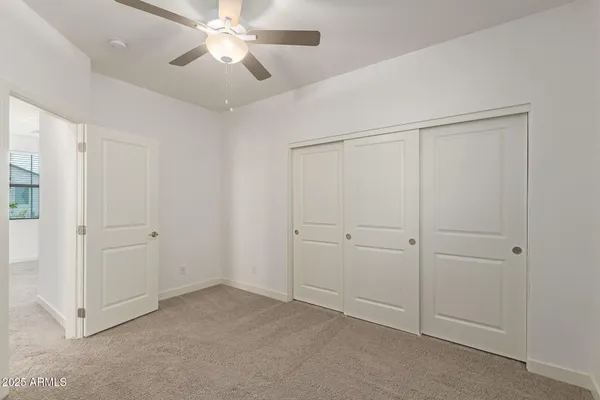 a bathroom with a sink double vanity granite tub and shower