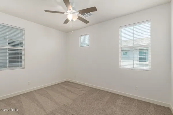 a bathroom with a bathtub and a toilet