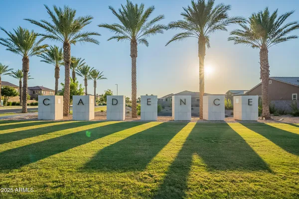 a view of a hallway with wooden floor and entryway
