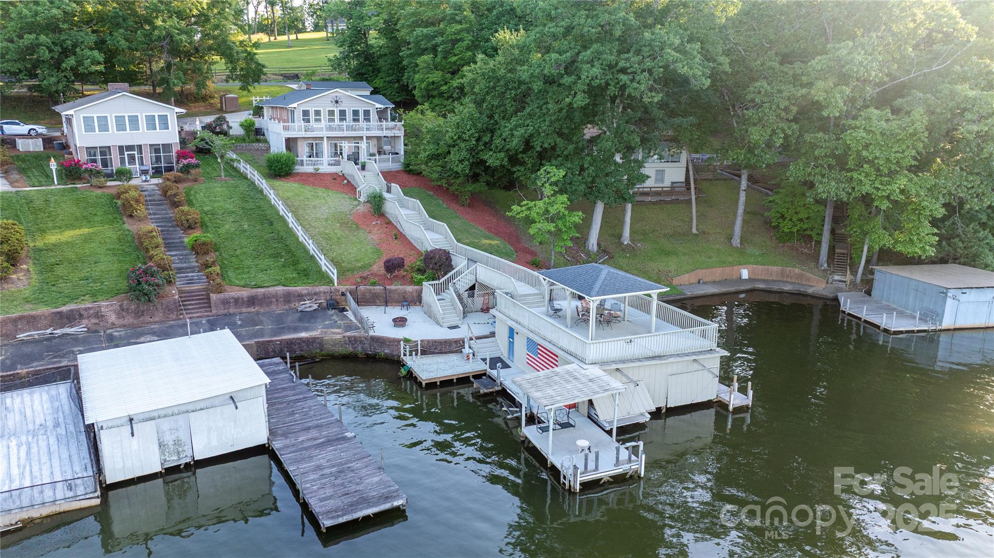 24264 Strand Drive Albemarle, NC 28001 - Photo 1 of 29 an aerial view of a house with swimming pool patio and outdoor seating