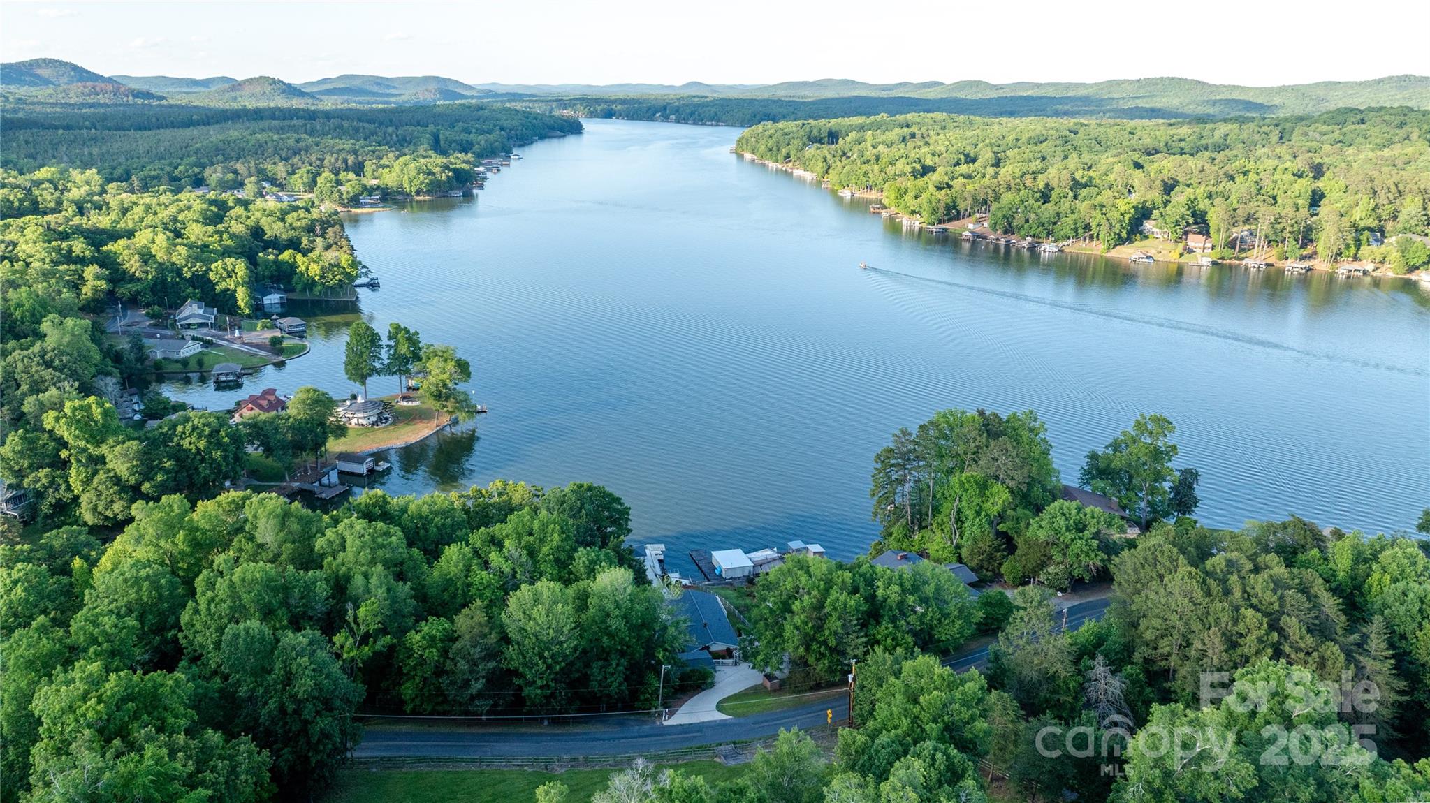 24264 Strand Drive Albemarle, NC 28001 - Photo 13 of 29 an aerial view of a houses with lake view