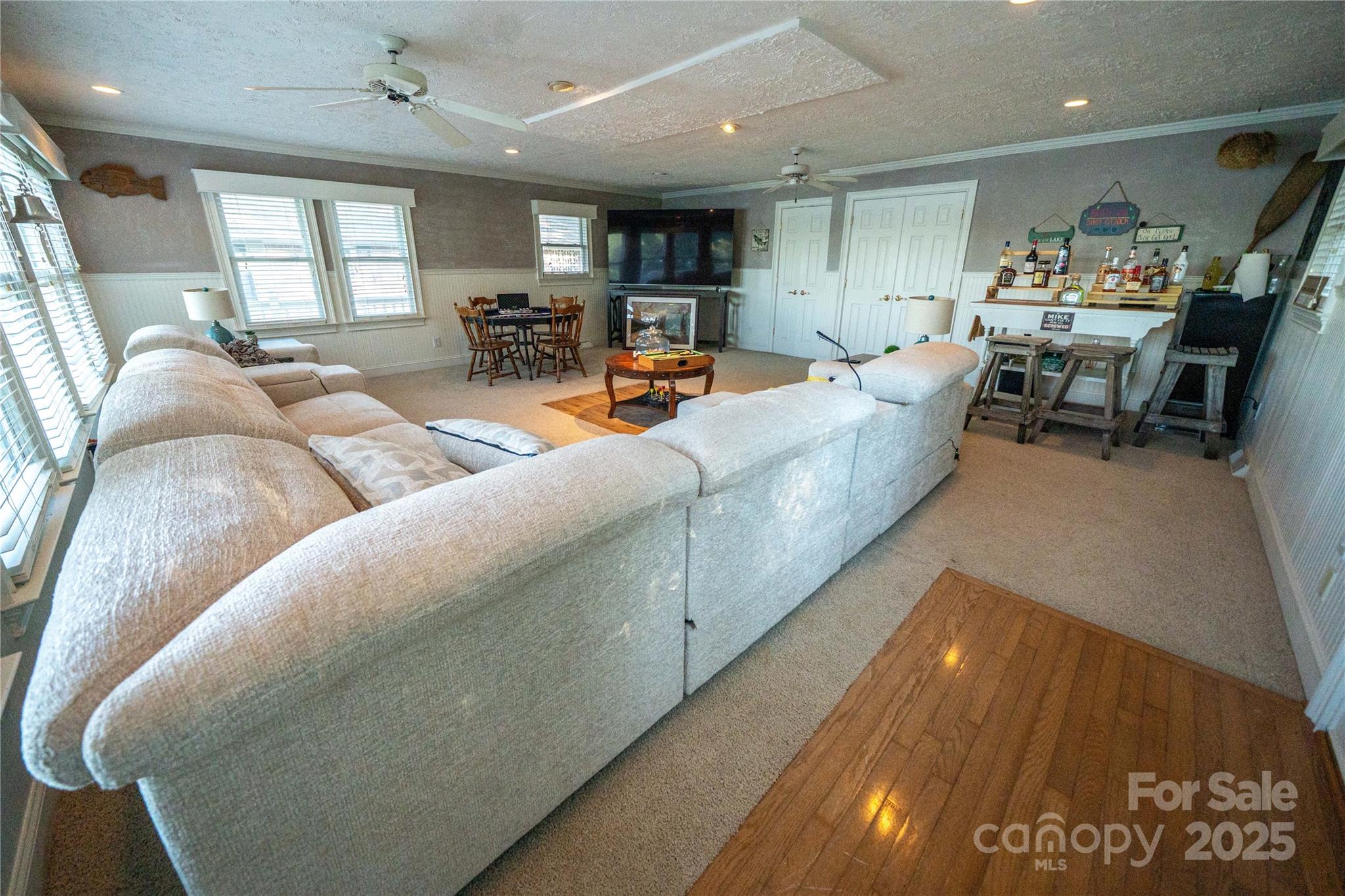 24264 Strand Drive Albemarle, NC 28001 - Photo 17 of 29 a living room with furniture and a large window