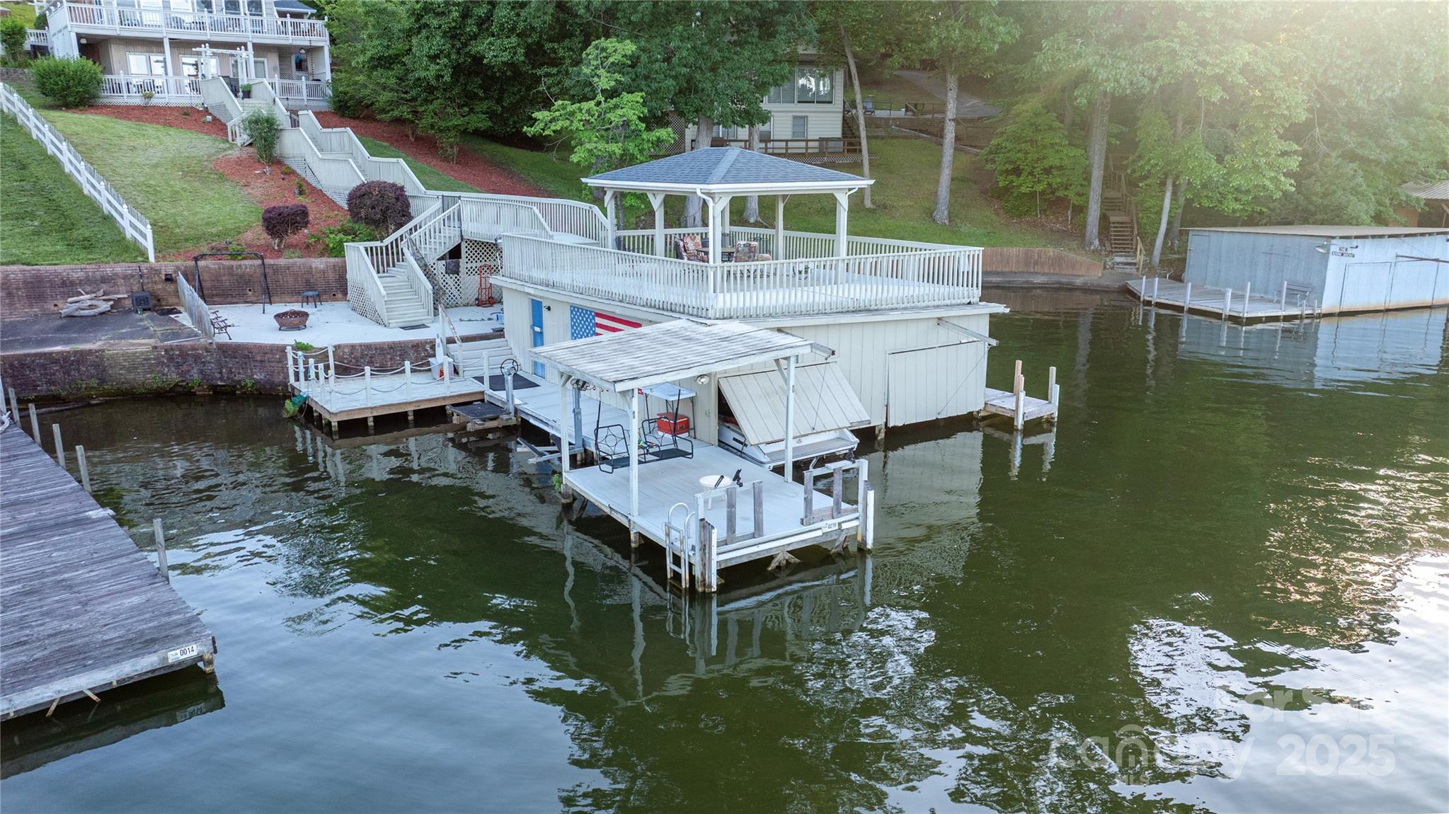 24264 Strand Drive Albemarle, NC 28001 - Photo 2 of 29 a aerial view of a house with swimming pool next to a yard