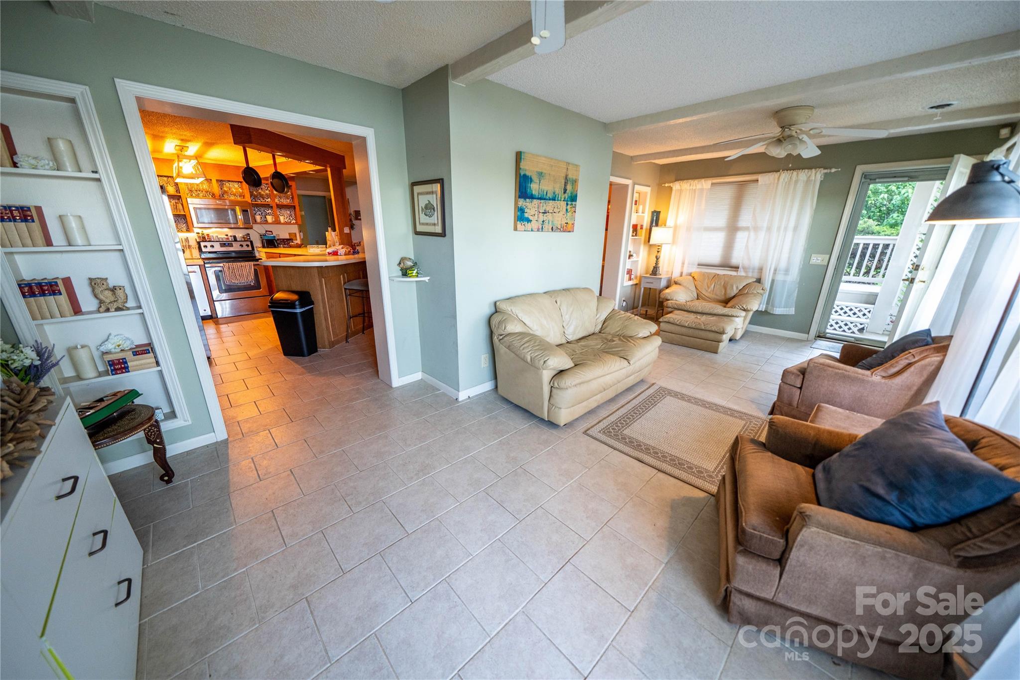 24264 Strand Drive Albemarle, NC 28001 - Photo 25 of 29 a living room with furniture and a large window