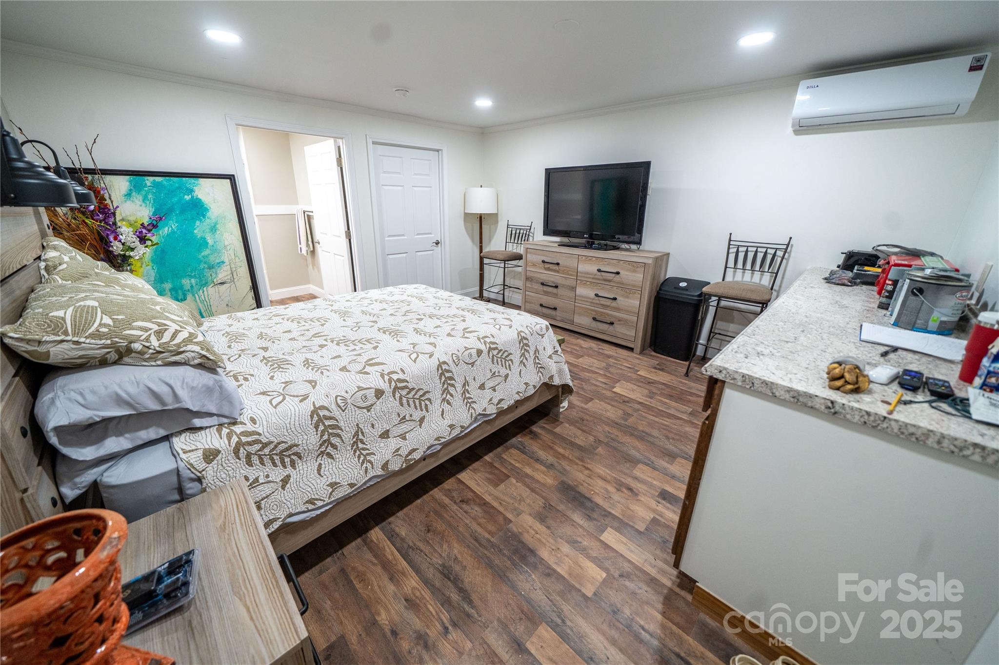 24264 Strand Drive Albemarle, NC 28001 - Photo 28 of 29 a bedroom with furniture and a flat screen tv