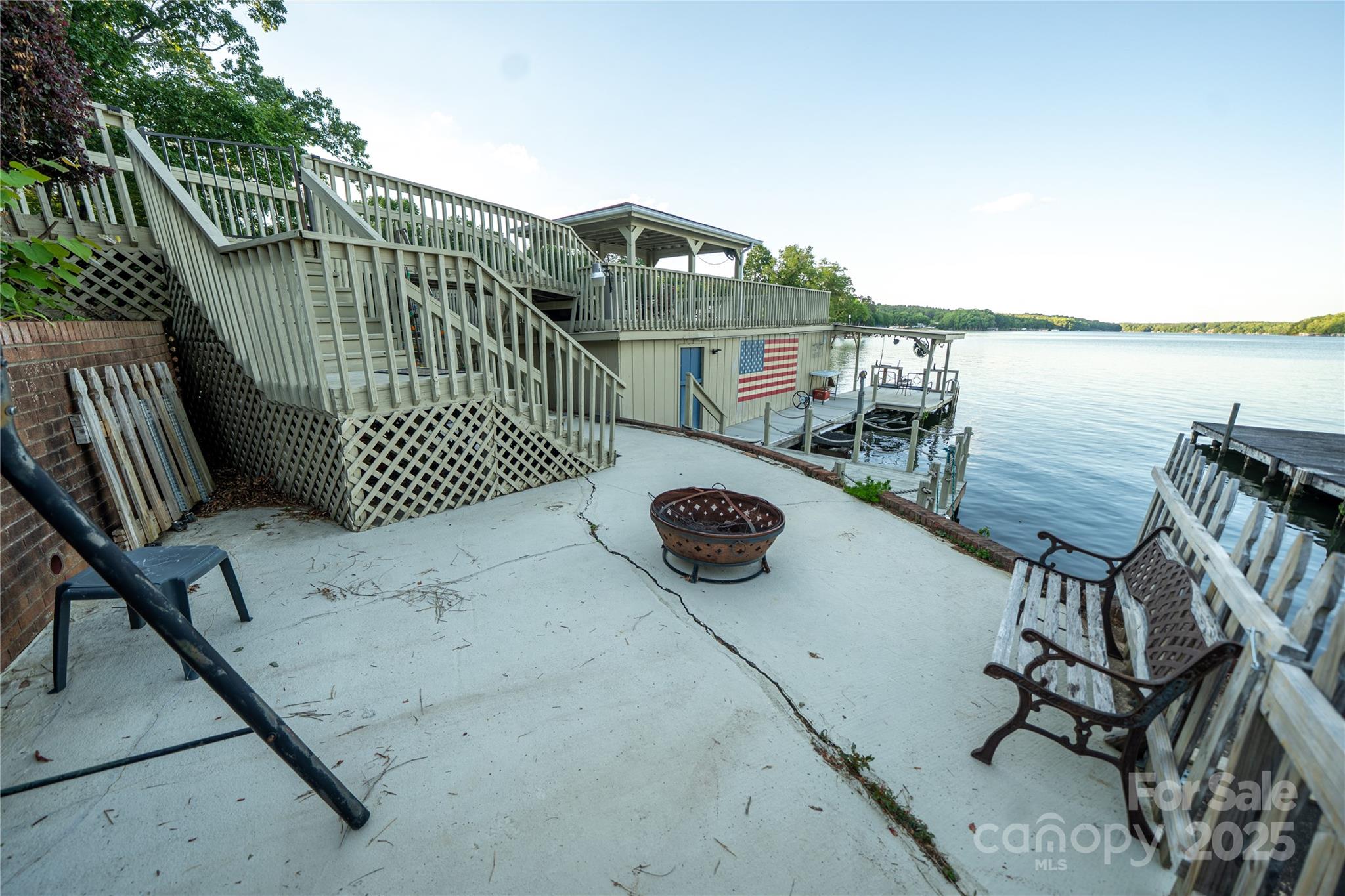 24264 Strand Drive Albemarle, NC 28001 - Photo 4 of 29 a view of a roof deck with couches and wooden floor