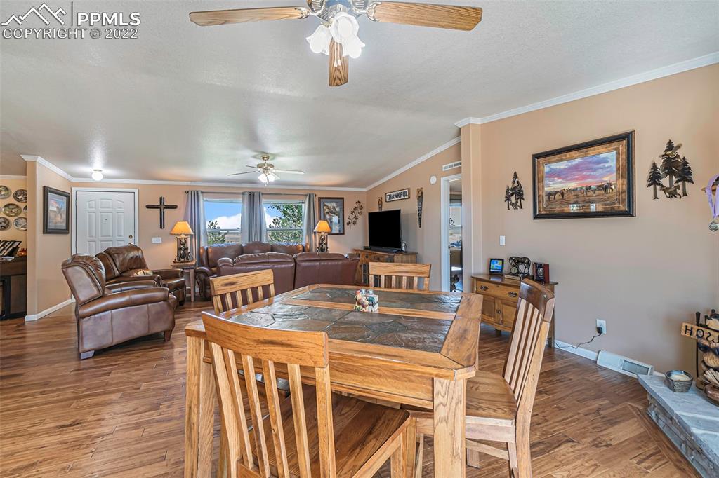 3180 Calhoun Byers Road Byers, CO 80103 - Photo 11 of 48 a view of a dining room with furniture