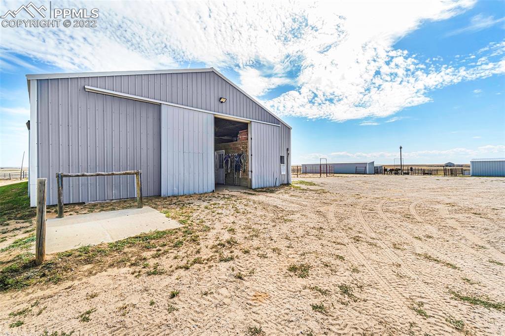 3180 Calhoun Byers Road Byers, CO 80103 - Photo 30 of 48 a view of a backyard of a house