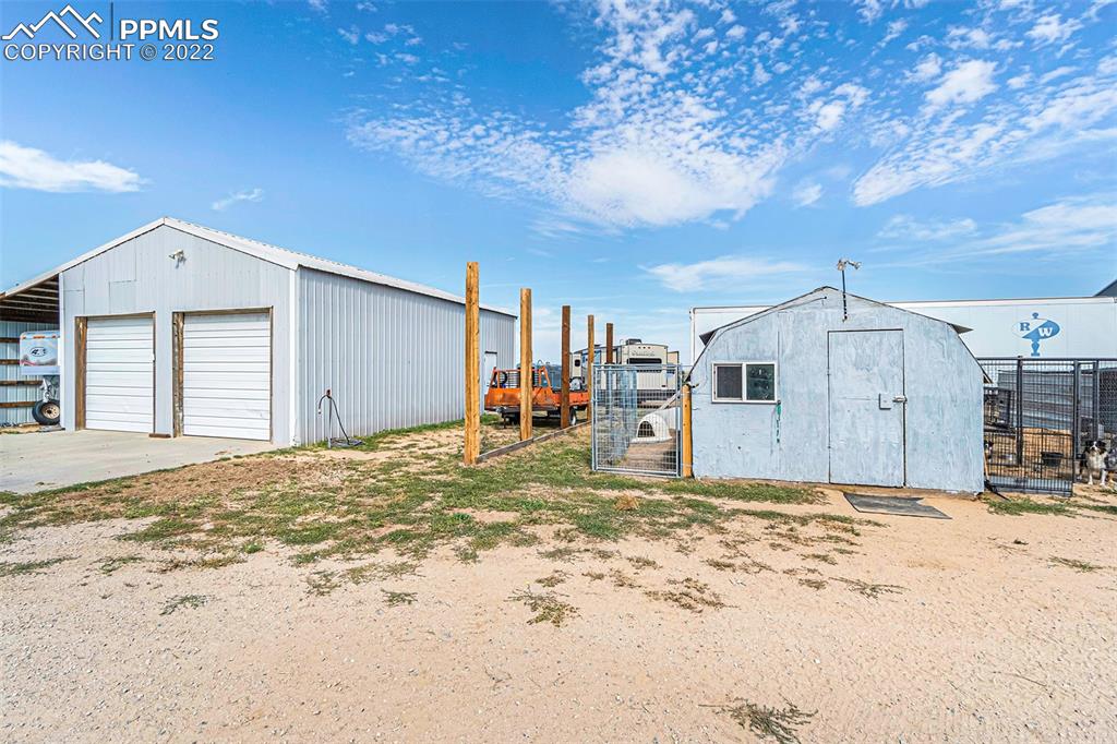 3180 Calhoun Byers Road Byers, CO 80103 - Photo 31 of 48 a view of a house with a snow in front of it